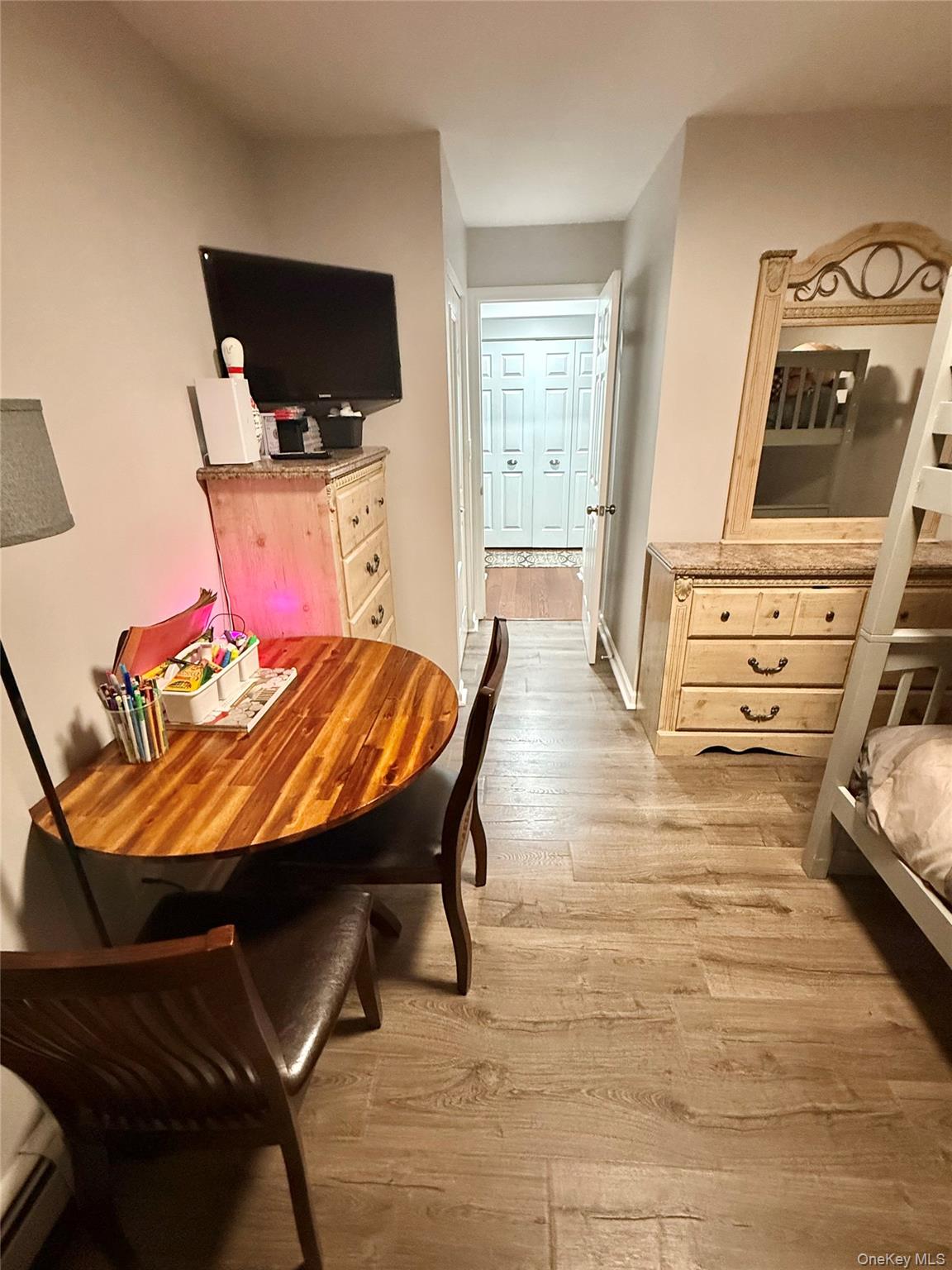 42 Briar Cliff, Unit 4 2 Ossining, NY 10562 - Photo 13 of 22 a living room with furniture and a flat screen tv