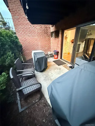 a view of barbeque grill and outdoor seating