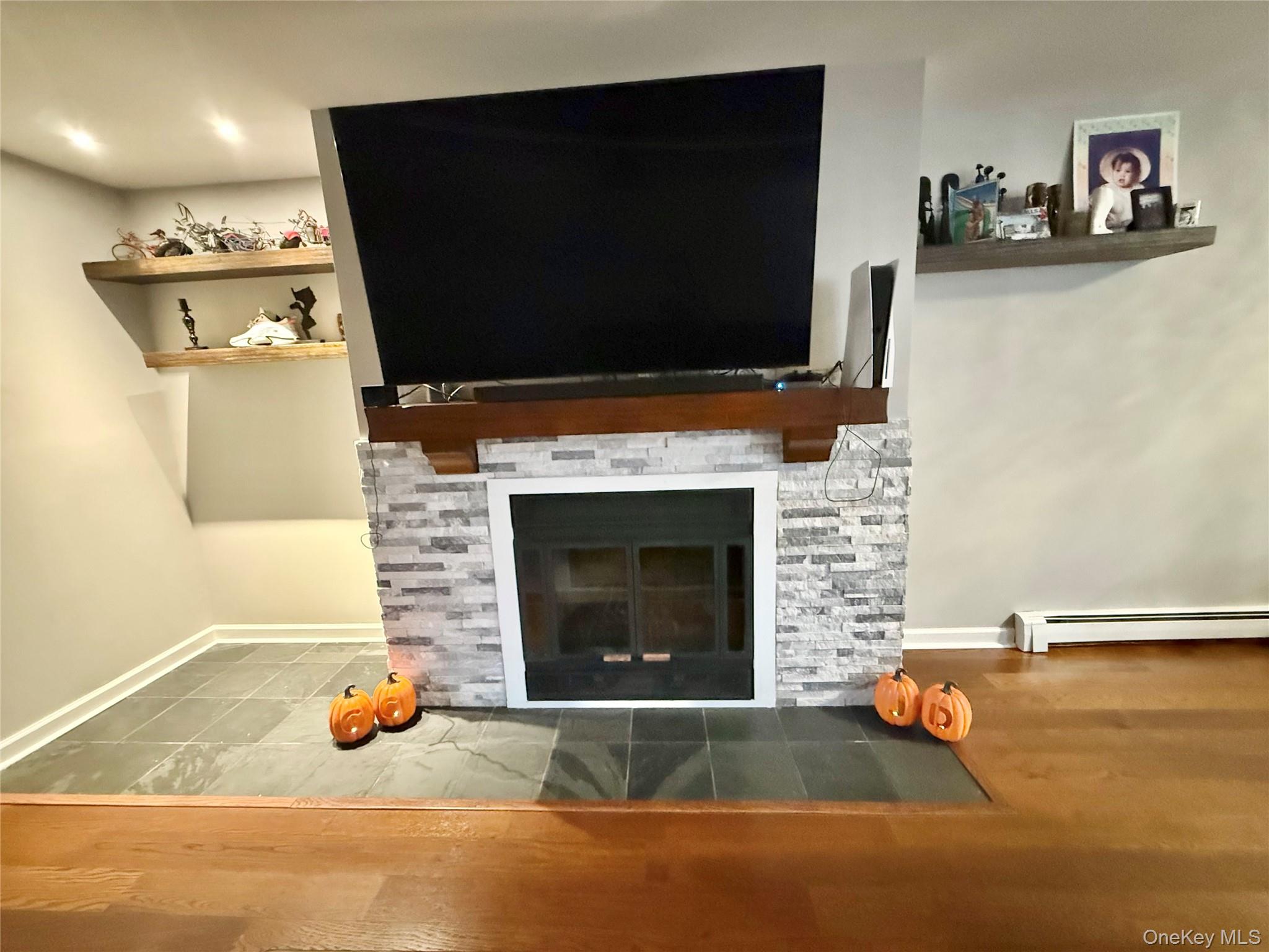 42 Briar Cliff, Unit 4 2 Ossining, NY 10562 - Photo 3 of 22 a living room with furniture and a fireplace
