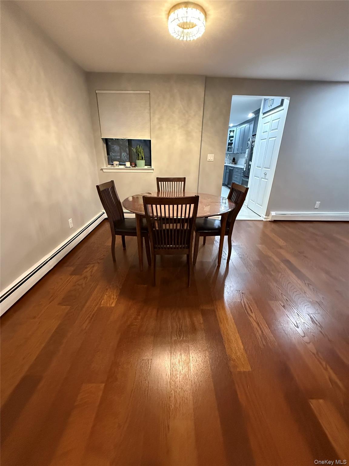 42 Briar Cliff, Unit 4 2 Ossining, NY 10562 - Photo 7 of 22 a view of a dining room with furniture and wooden floor