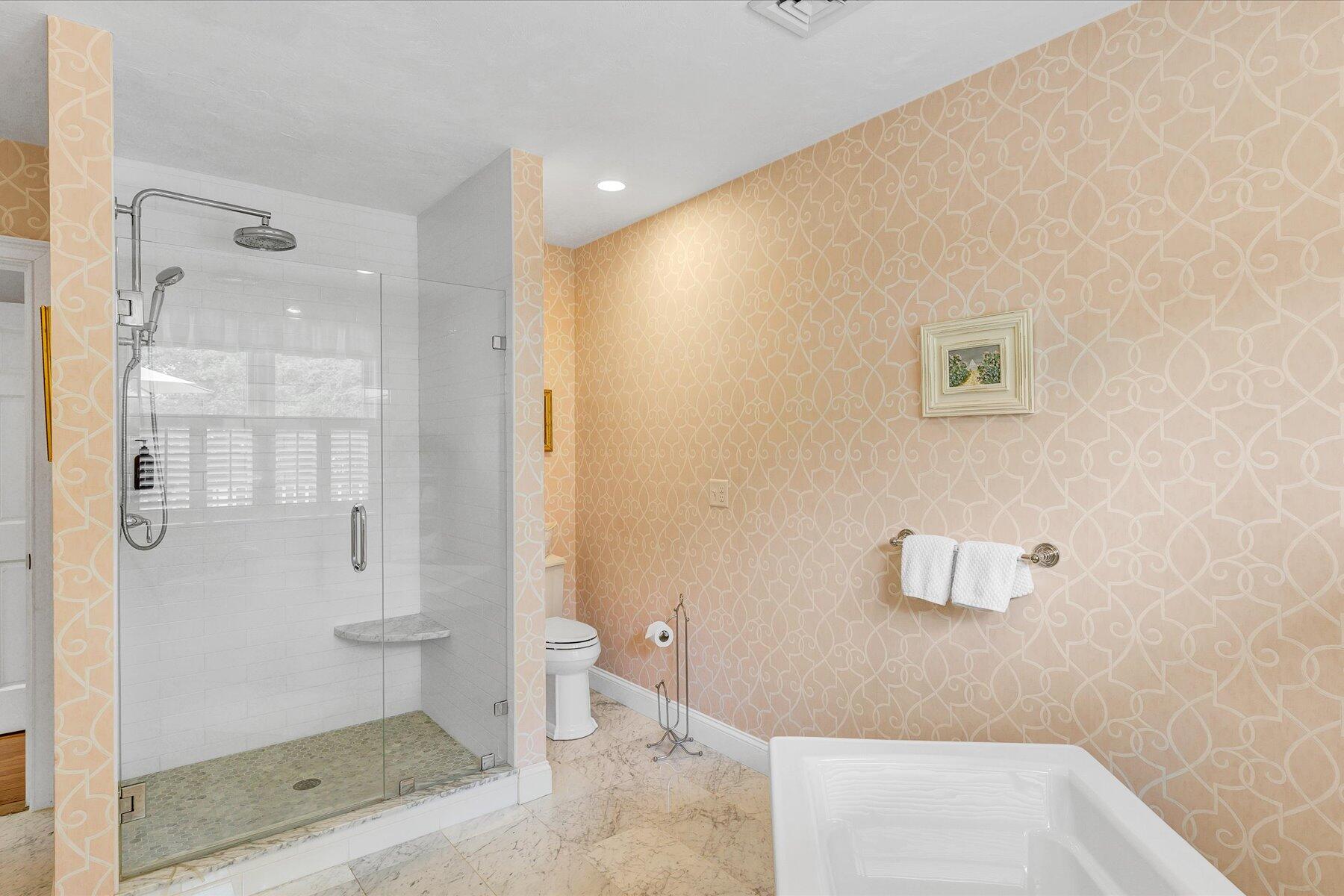 663 Crowells Bog Road Brewster, MA 02631 - Photo 19 of 46 a bathroom with a shower and toilet