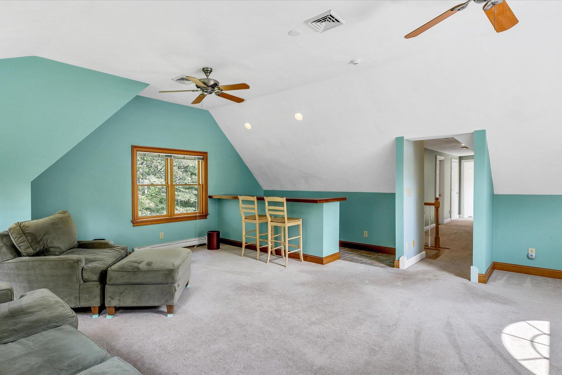 663 Crowells Bog Road Brewster, MA 02631 - Photo 29 of 46 a bedroom with furniture and a ceiling fan