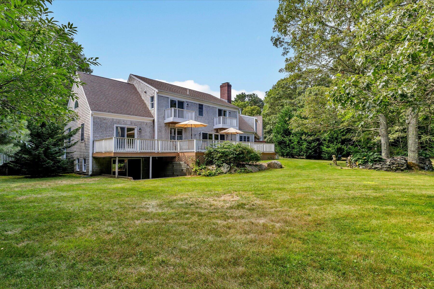663 Crowells Bog Road Brewster, MA 02631 - Photo 36 of 46 a house view with a garden space