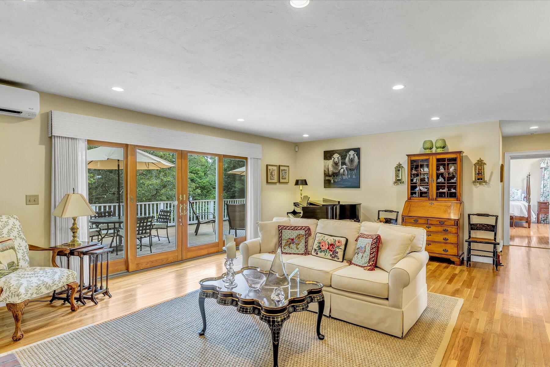 663 Crowells Bog Road Brewster, MA 02631 - Photo 7 of 46 a living room with furniture and a large window