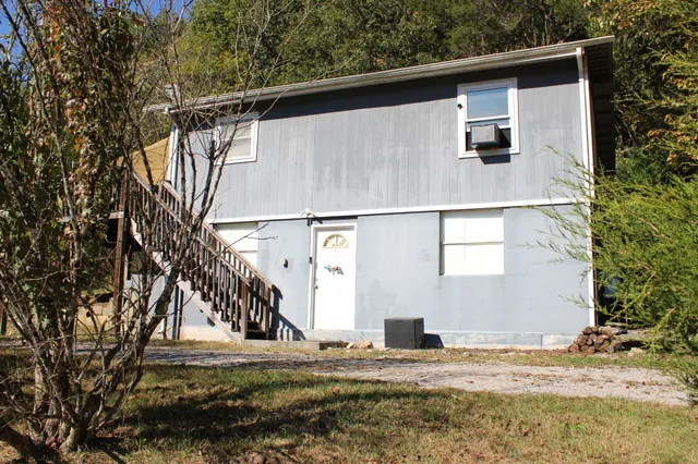 a view of a front of house with street
