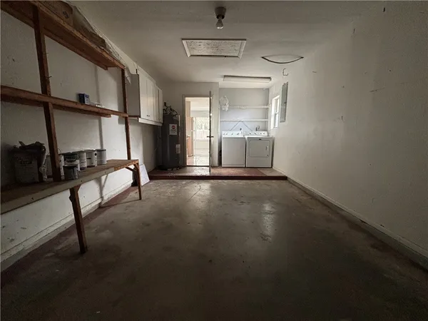 a view of a storage & utility room with washer and dryer
