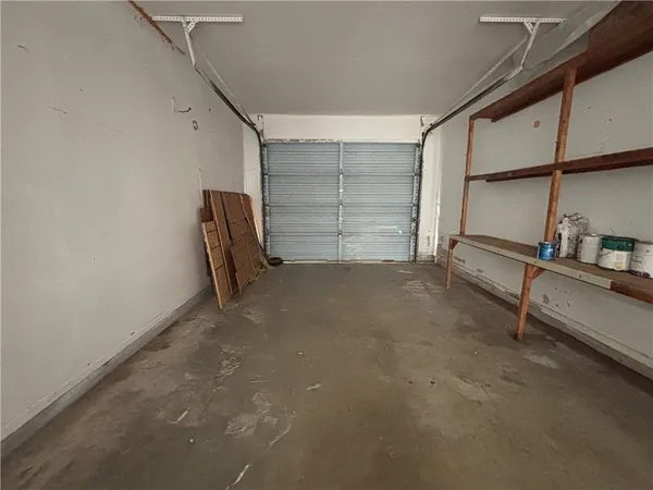 a view of an empty room and windows