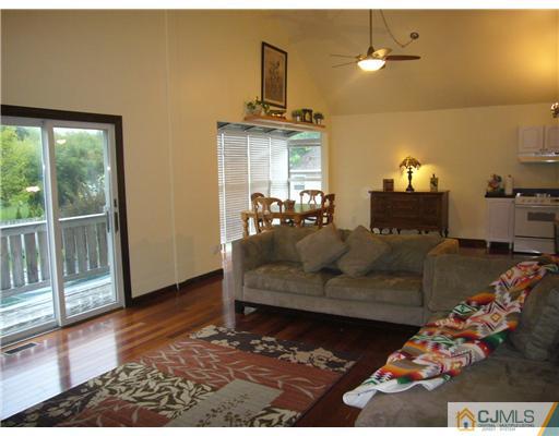 15 Channing Road East Brunswick, NJ 08816 - Photo 7 of 10 a living room with furniture and wooden floor