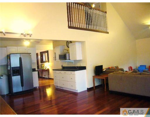 15 Channing Road East Brunswick, NJ 08816 - Photo 10 of 10 a living room with furniture and a wooden floor