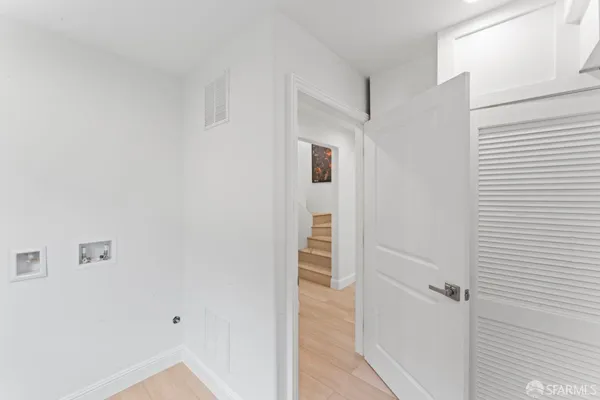 a view of a hallway with closet