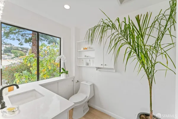 a bathroom with a bathtub and a sink