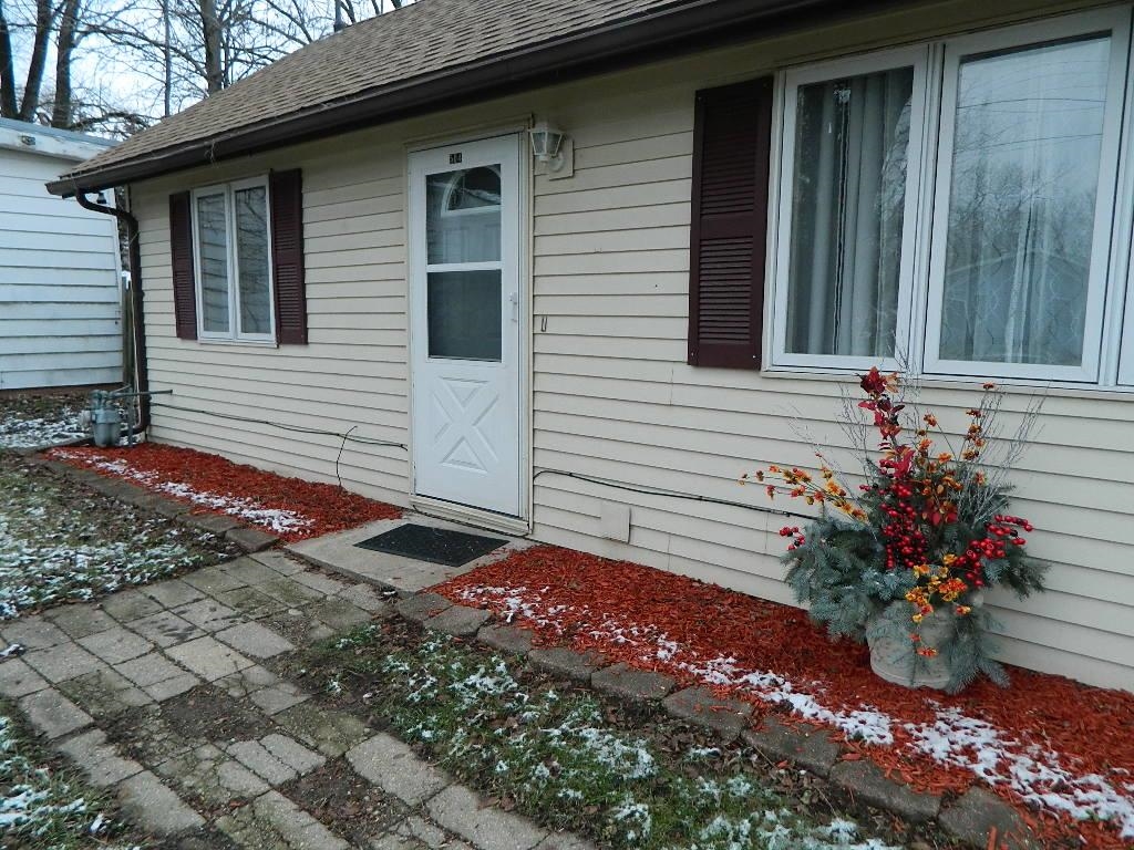 504 Fitch Road Rockford, IL 61109 - Photo 3 of 15 a view of a house with a yard