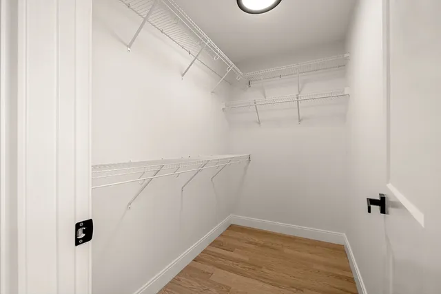 a view of a room with racks on the wall