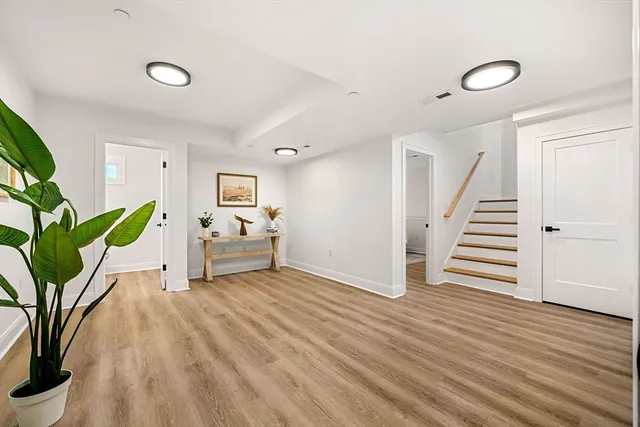 a view of livingroom with furniture and stairs