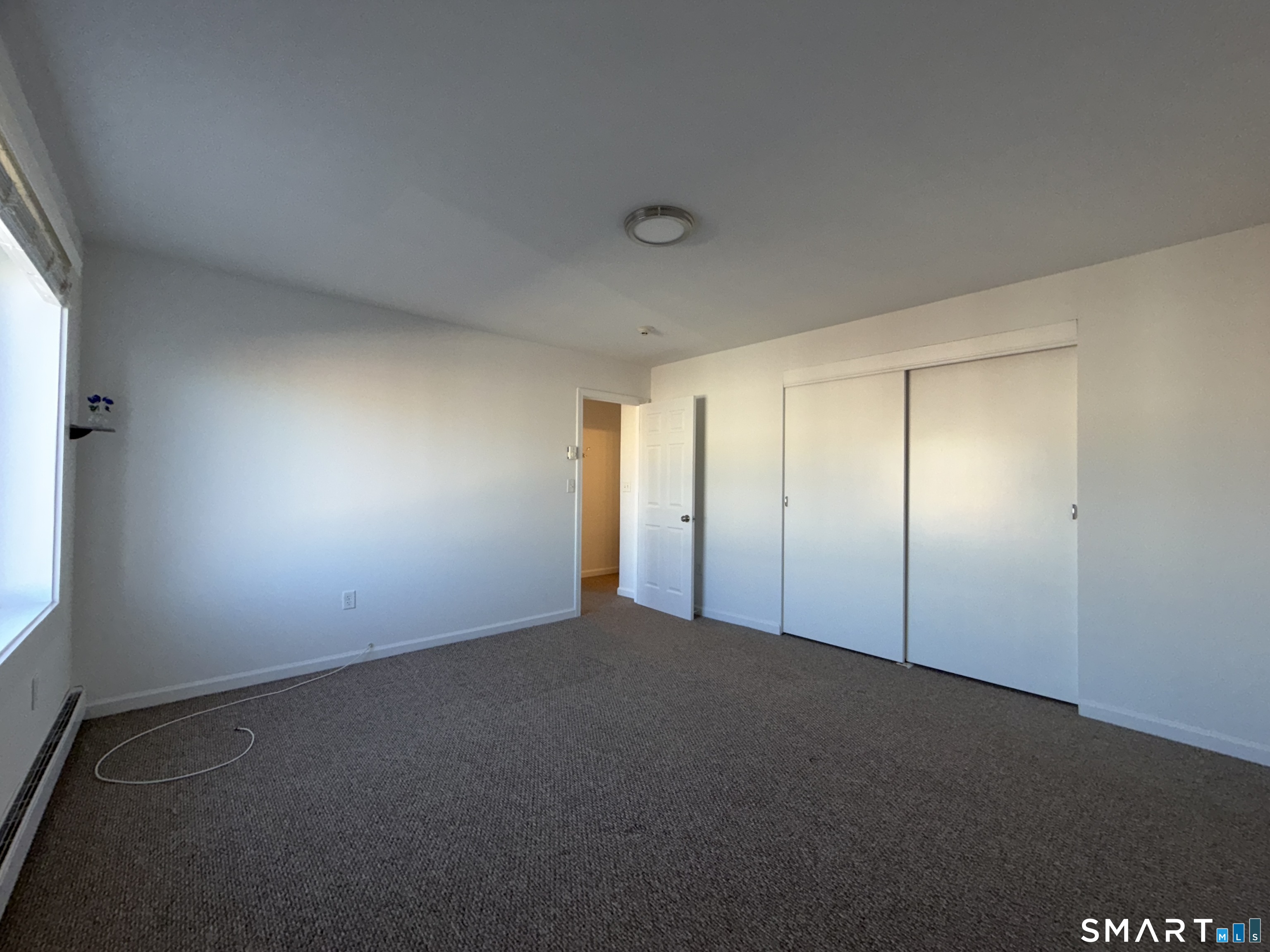 69 Cove Road, Unit B9 Stamford, CT 06902 - Photo 13 of 17 view from inside the primary bedroom