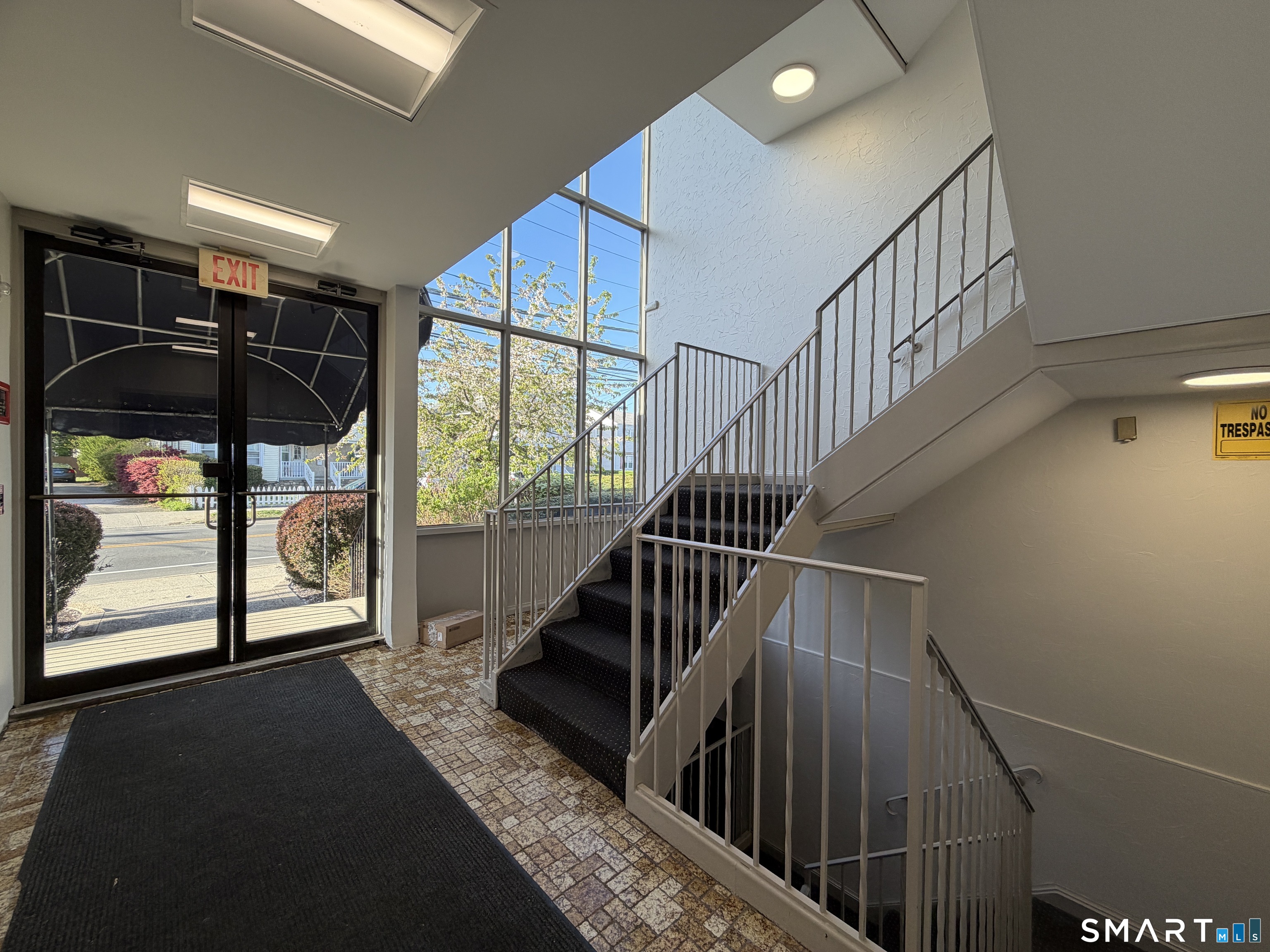 69 Cove Road, Unit B9 Stamford, CT 06902 - Photo 2 of 17 front foyer