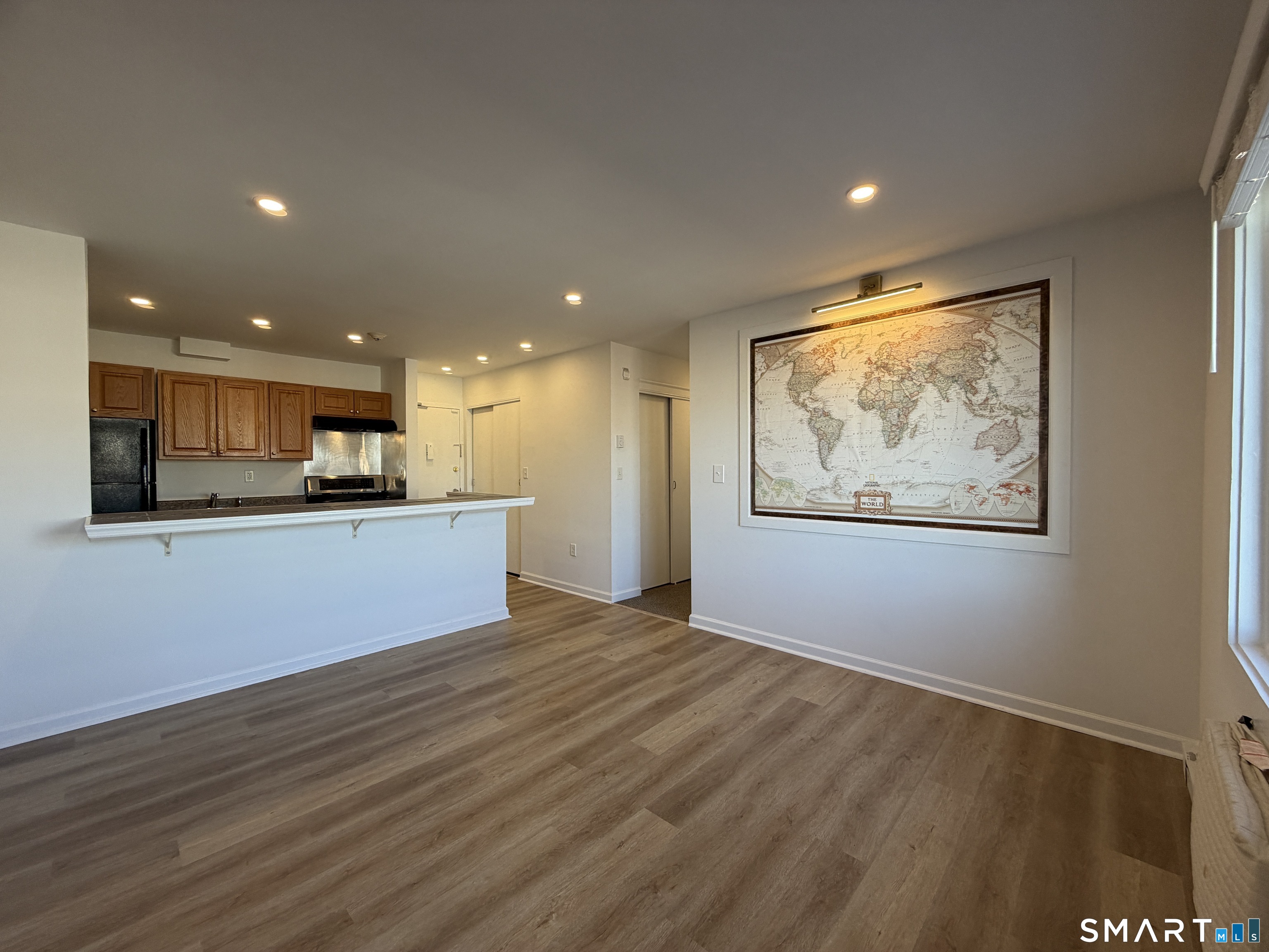 69 Cove Road, Unit B9 Stamford, CT 06902 - Photo 4 of 17 View from balcony door to kitchen