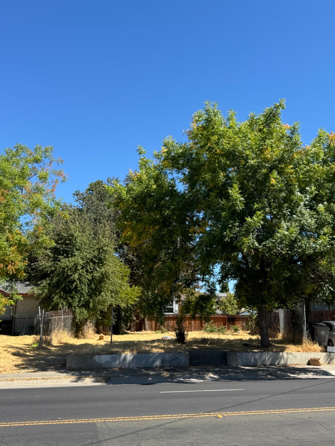 3951 Broadway Sacramento, CA 95817 - Photo 12 of 20 a view of a yard and car parked