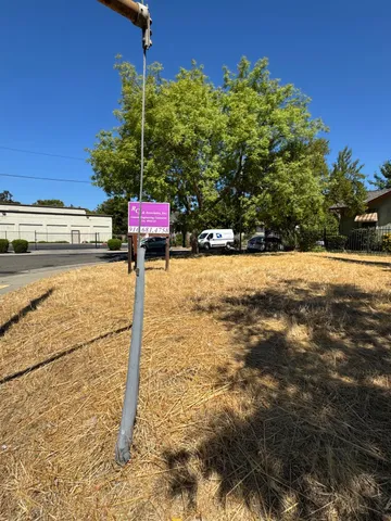 a view of swimming pool with a yard