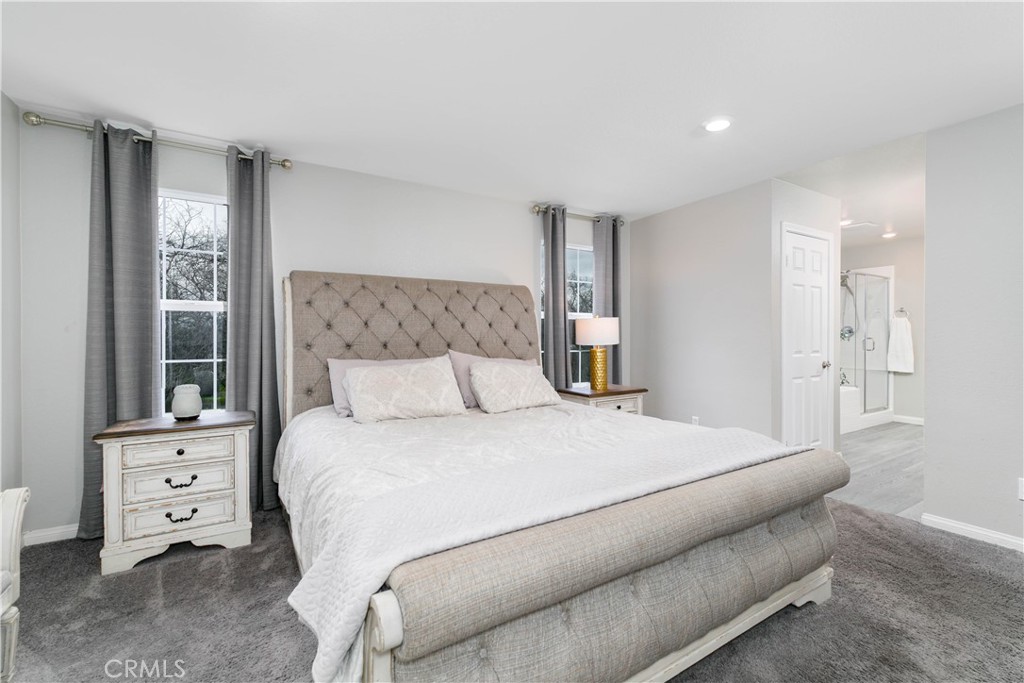 3682 Loheria Street Riverside, CA 92503 - Photo 14 of 37 a bedroom with a bed and a dresser