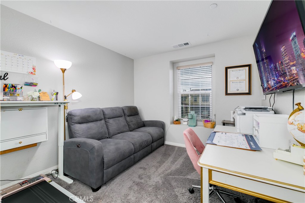 3682 Loheria Street Riverside, CA 92503 - Photo 24 of 37 a living room with furniture and a window