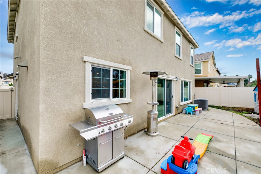 3682 Loheria Street Riverside, CA 92503 - Photo 29 of 37 a building outdoor space with patio furniture and potted plants
