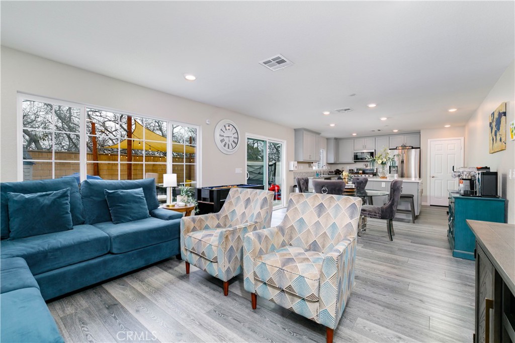 3682 Loheria Street Riverside, CA 92503 - Photo 6 of 37 a living room with furniture and a large window