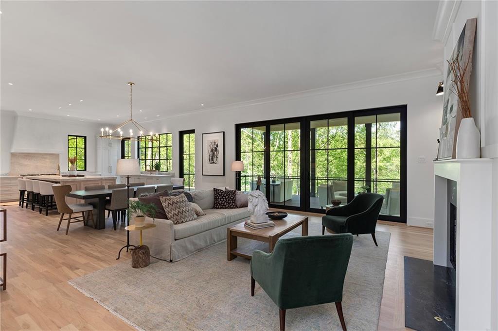 3290 Dunlop Court Atlanta, GA 30319 - Photo 13 of 81 a living room with furniture and a large window