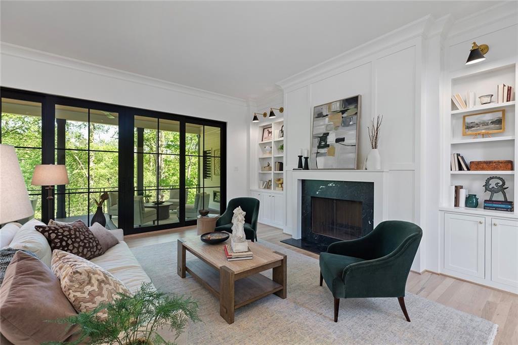 3290 Dunlop Court Atlanta, GA 30319 - Photo 16 of 81 a living room with furniture and a fireplace