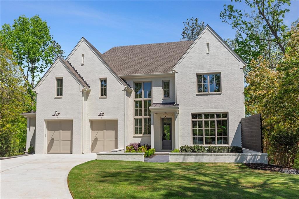 3290 Dunlop Court Atlanta, GA 30319 - Photo 3 of 81 a view of a house with swimming pool next to a yard
