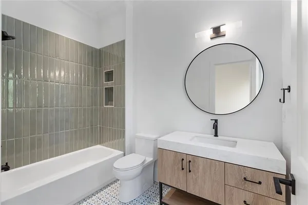 a bathroom with a sink and a toilet