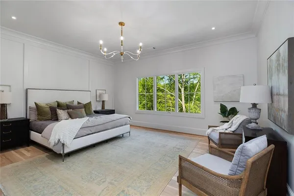 a view of a kitchen with a sink and a refrigerator