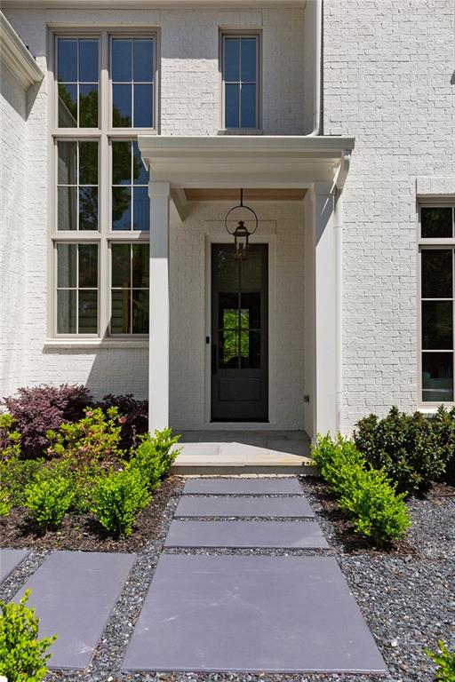 3290 Dunlop Court Atlanta, GA 30319 - Photo 5 of 81 a front view of a house with a yard