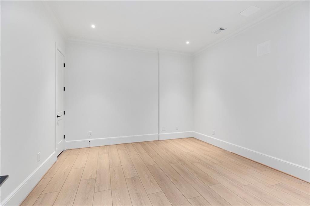 3290 Dunlop Court Atlanta, GA 30319 - Photo 51 of 81 a view of an empty room with wooden floor
