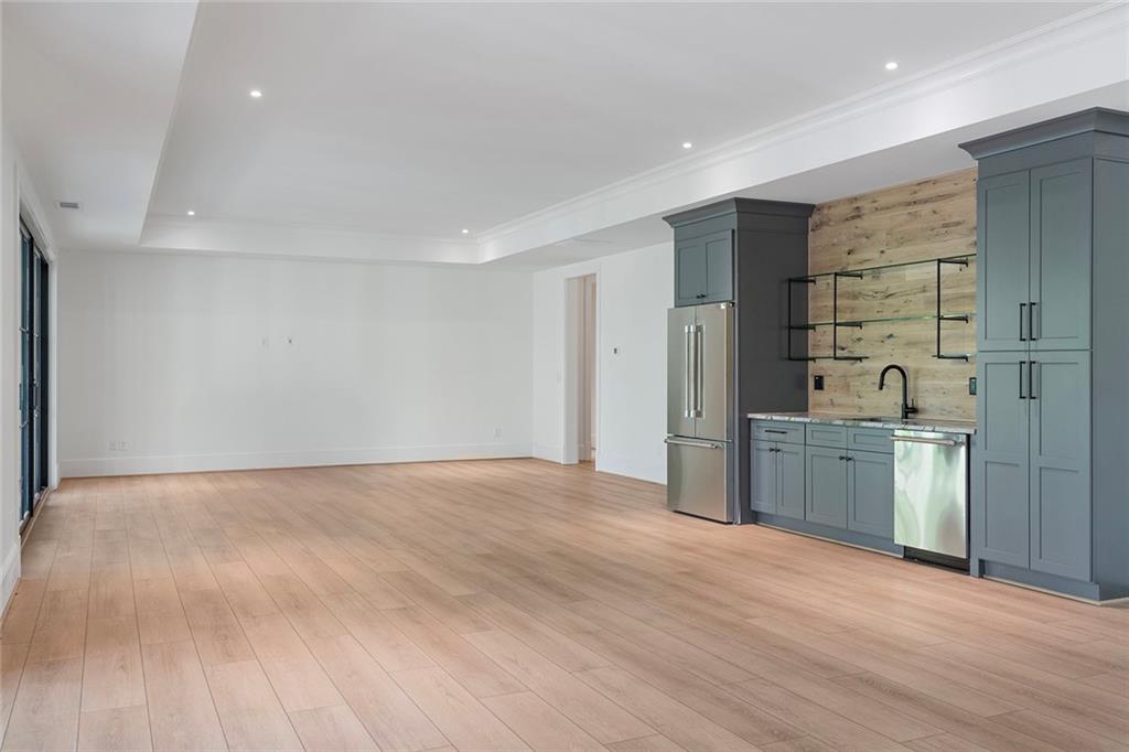 3290 Dunlop Court Atlanta, GA 30319 - Photo 56 of 81 a view of a kitchen with a sink and a refrigerator