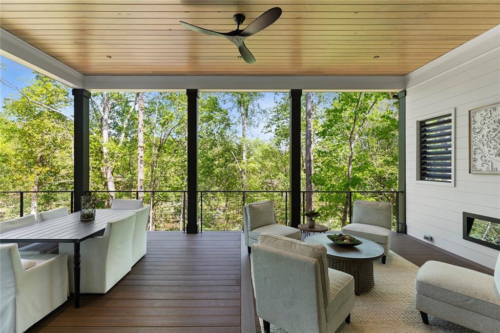 3290 Dunlop Court Atlanta, GA 30319 - Photo 59 of 81 a living room with furniture and windows