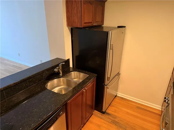 a view of a hallway with windows