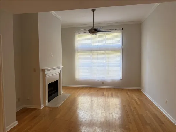 a kitchen with granite countertop a stove and a sink