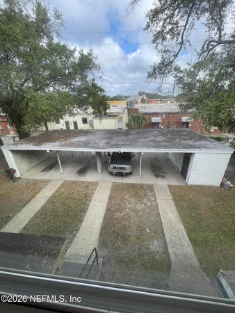 a view of a yard from a outdoor