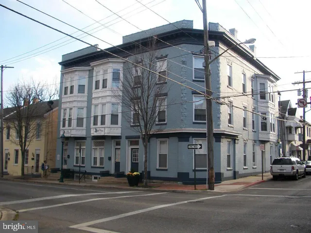 a view of a building and a street
