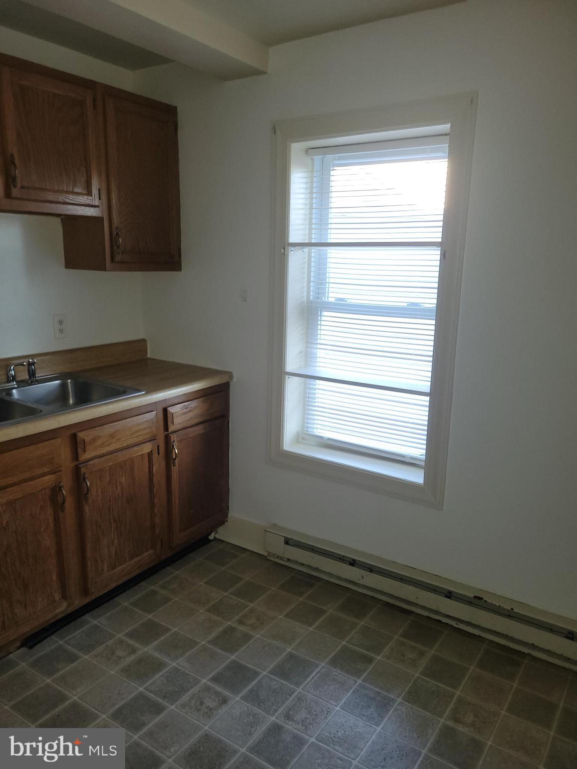 201 East Franklin Street, Unit 6 Hagerstown, MD 21740 - Photo 2 of 9 a room with cabinets