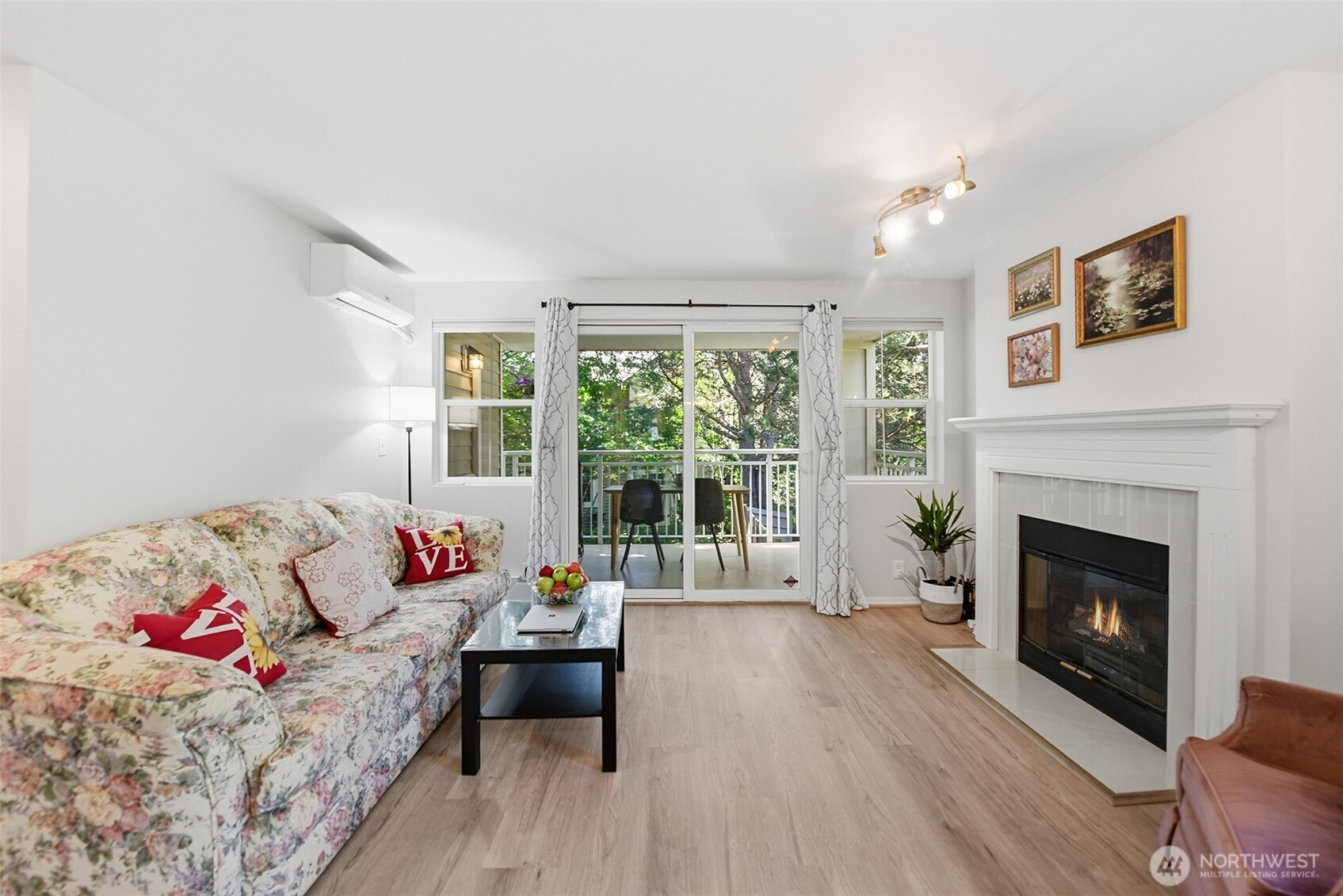 4423 249th Terrace Southeast Issaquah, WA 98029 - Photo 6 of 27 a living room with furniture and a fireplace