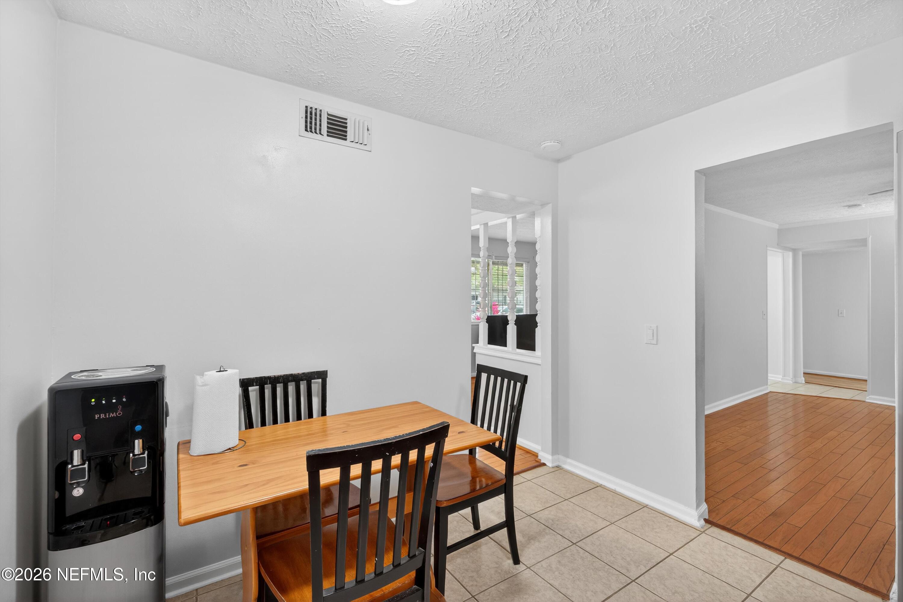 3570 Grassy Ride Drive Jacksonville, FL 32223 - Photo 20 of 51 a view of a room with furniture and wooden floor
