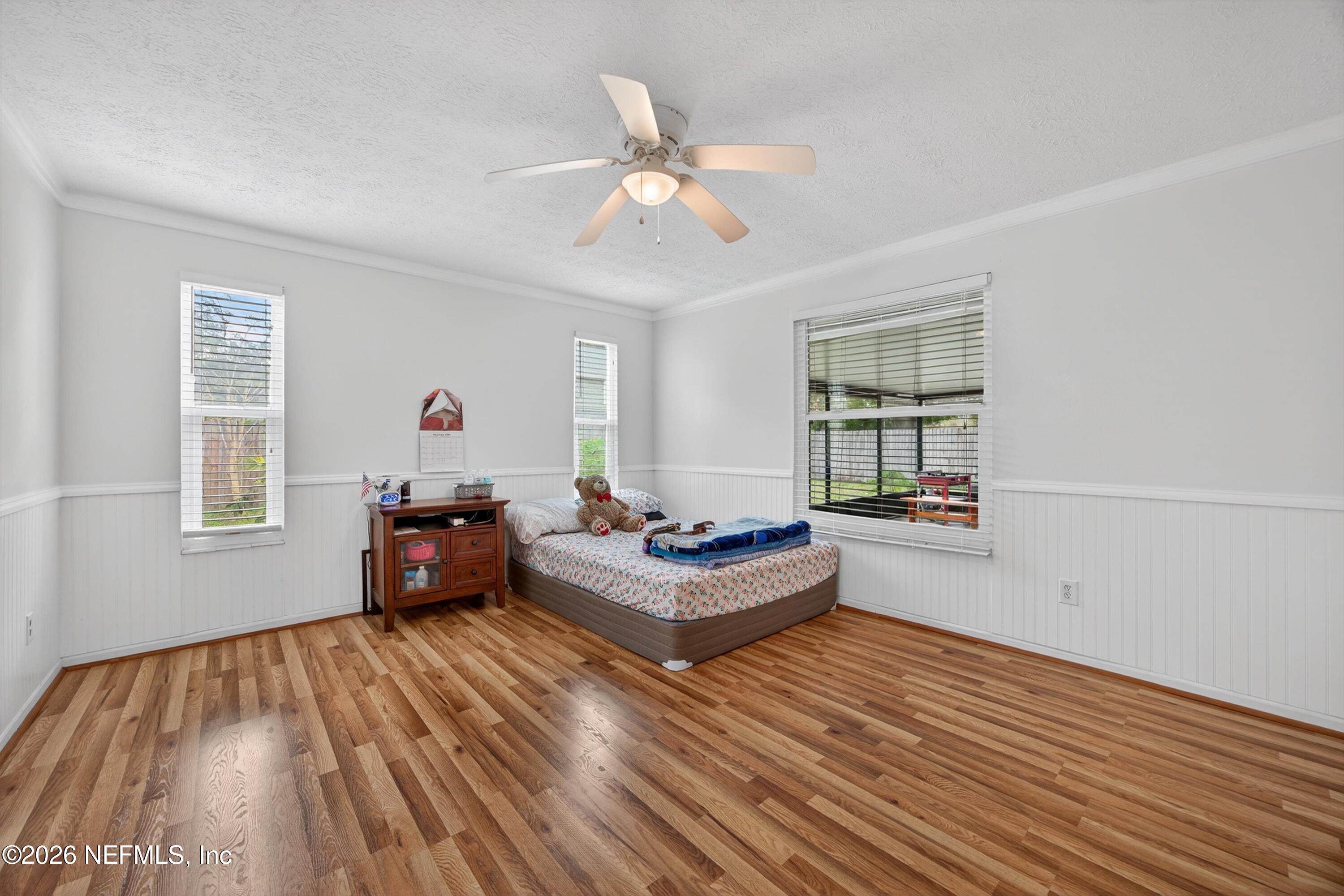 3570 Grassy Ride Drive Jacksonville, FL 32223 - Photo 21 of 51 a living room with furniture and a wooden floor