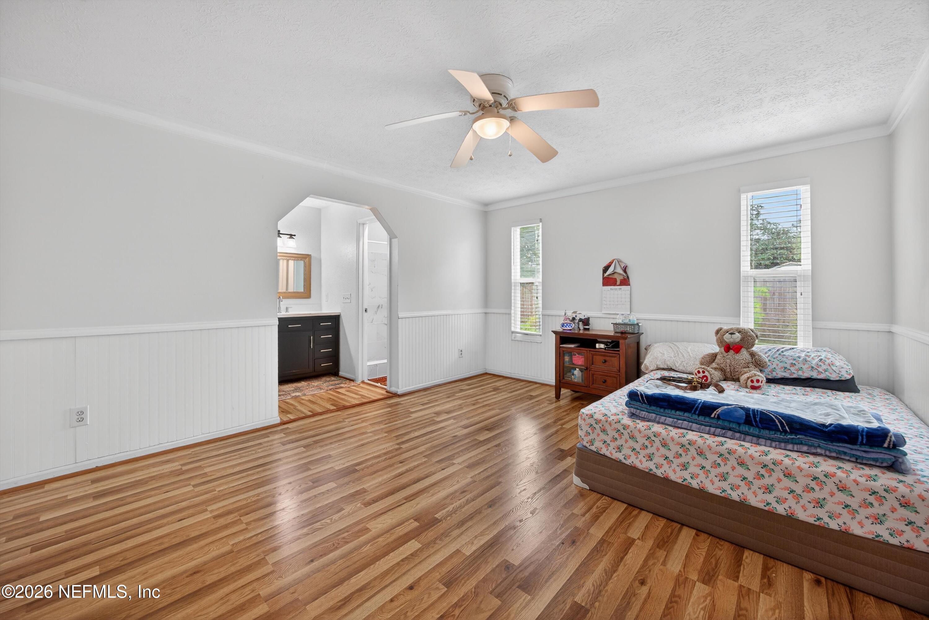 3570 Grassy Ride Drive Jacksonville, FL 32223 - Photo 22 of 51 a living room with furniture and a wooden floor
