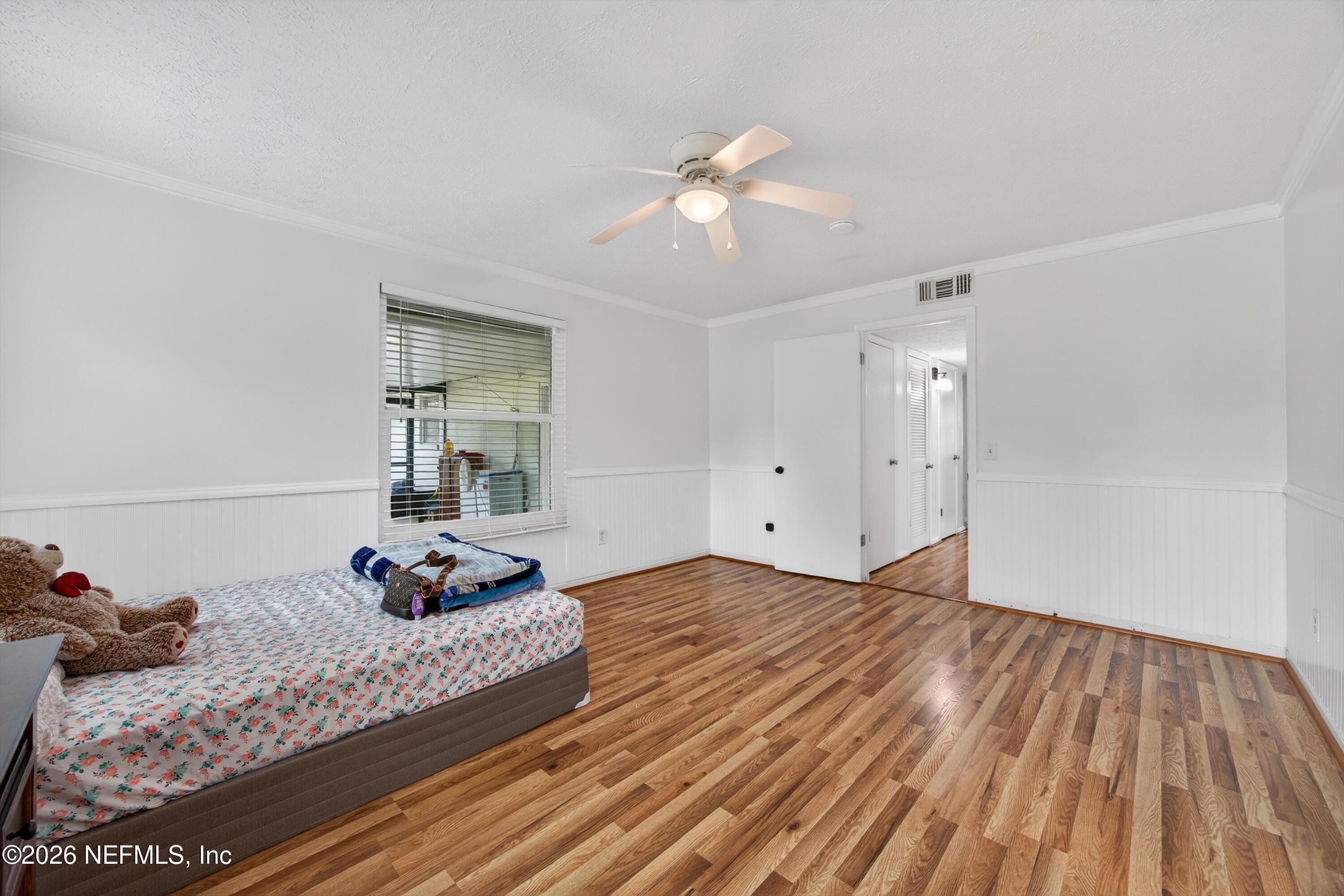 3570 Grassy Ride Drive Jacksonville, FL 32223 - Photo 23 of 51 a bed room with a bed and a window