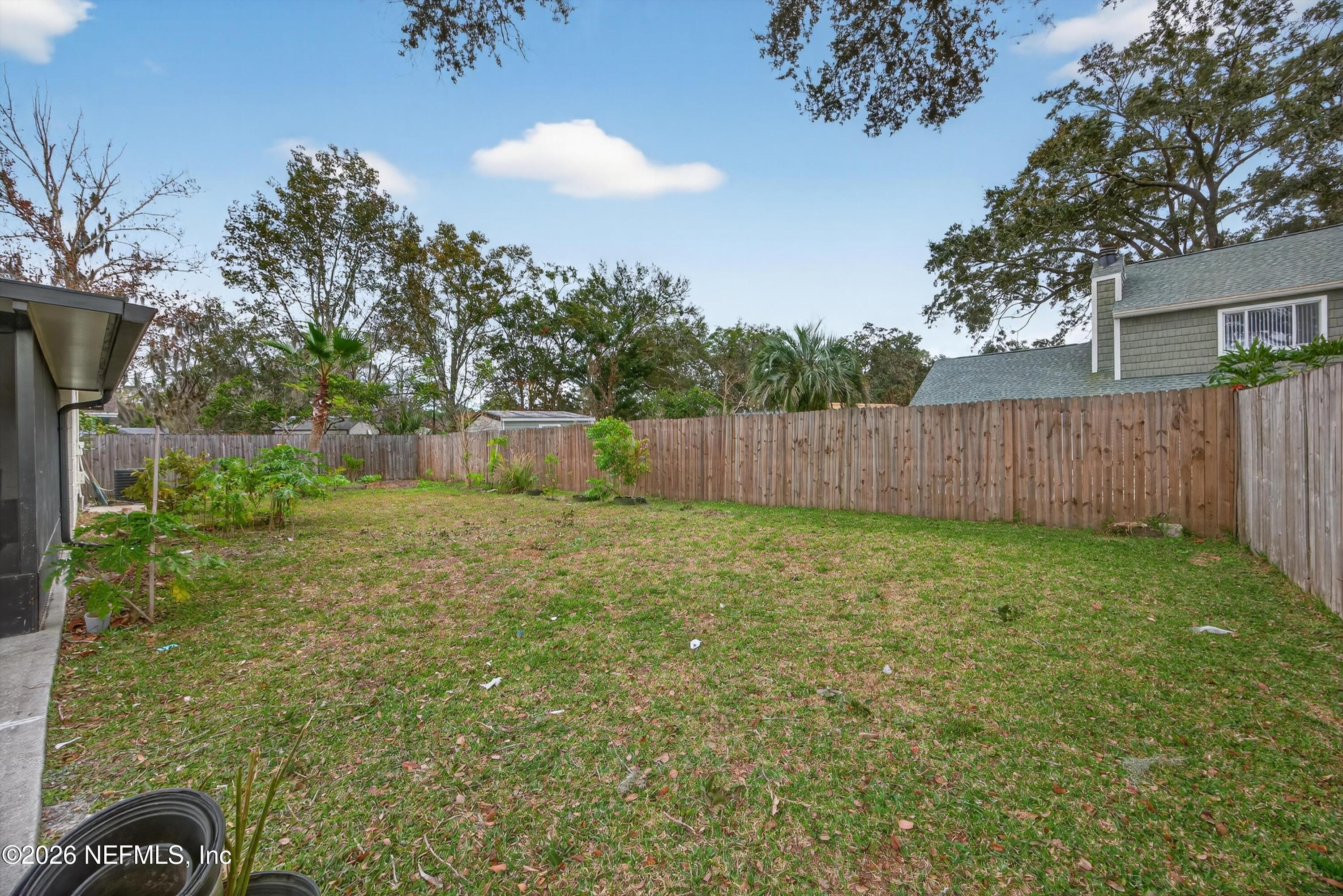 3570 Grassy Ride Drive Jacksonville, FL 32223 - Photo 36 of 51 a view of a backyard