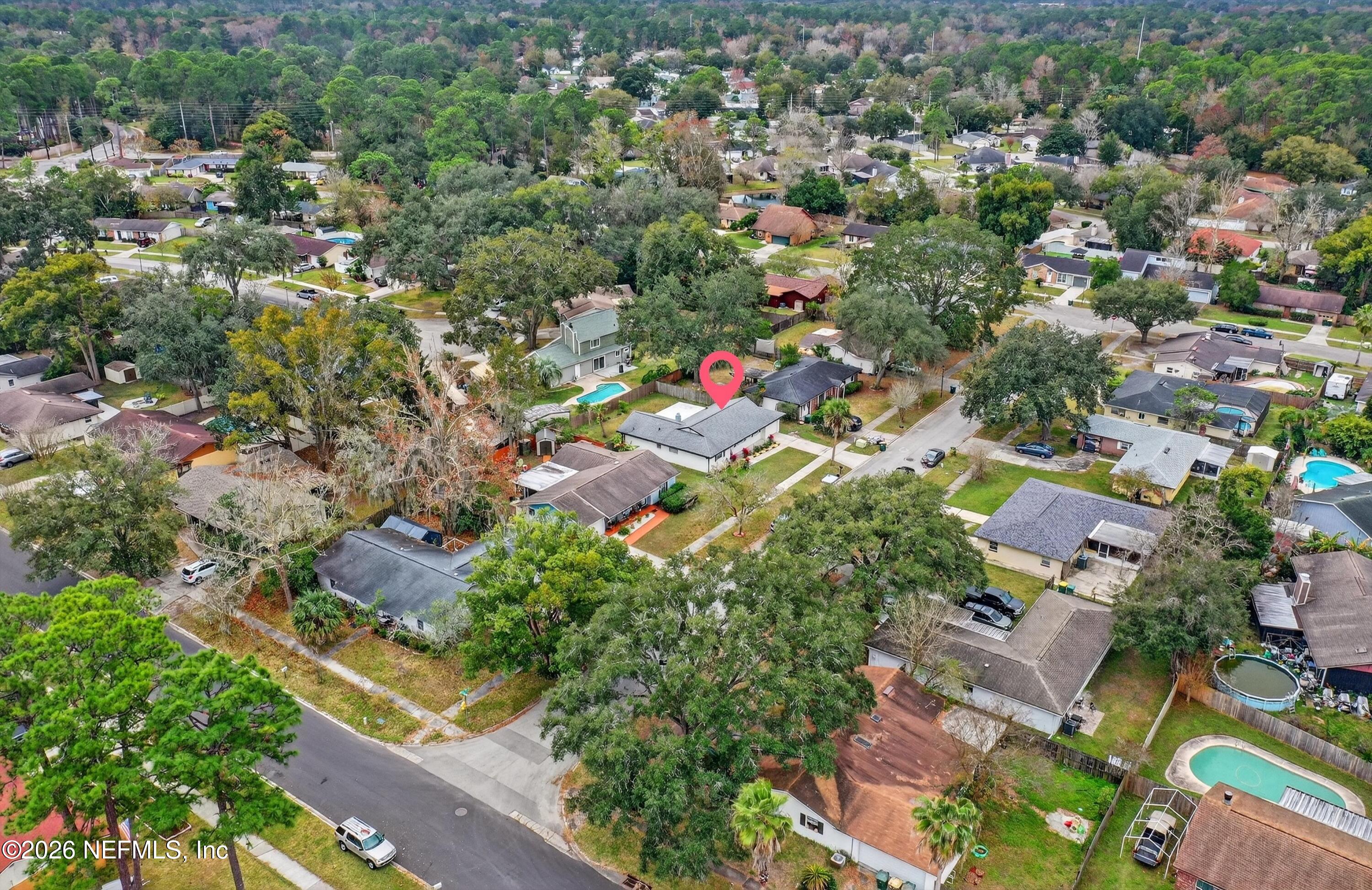 3570 Grassy Ride Drive Jacksonville, FL 32223 - Photo 40 of 51 an aerial view of residential houses with outdoor space and trees