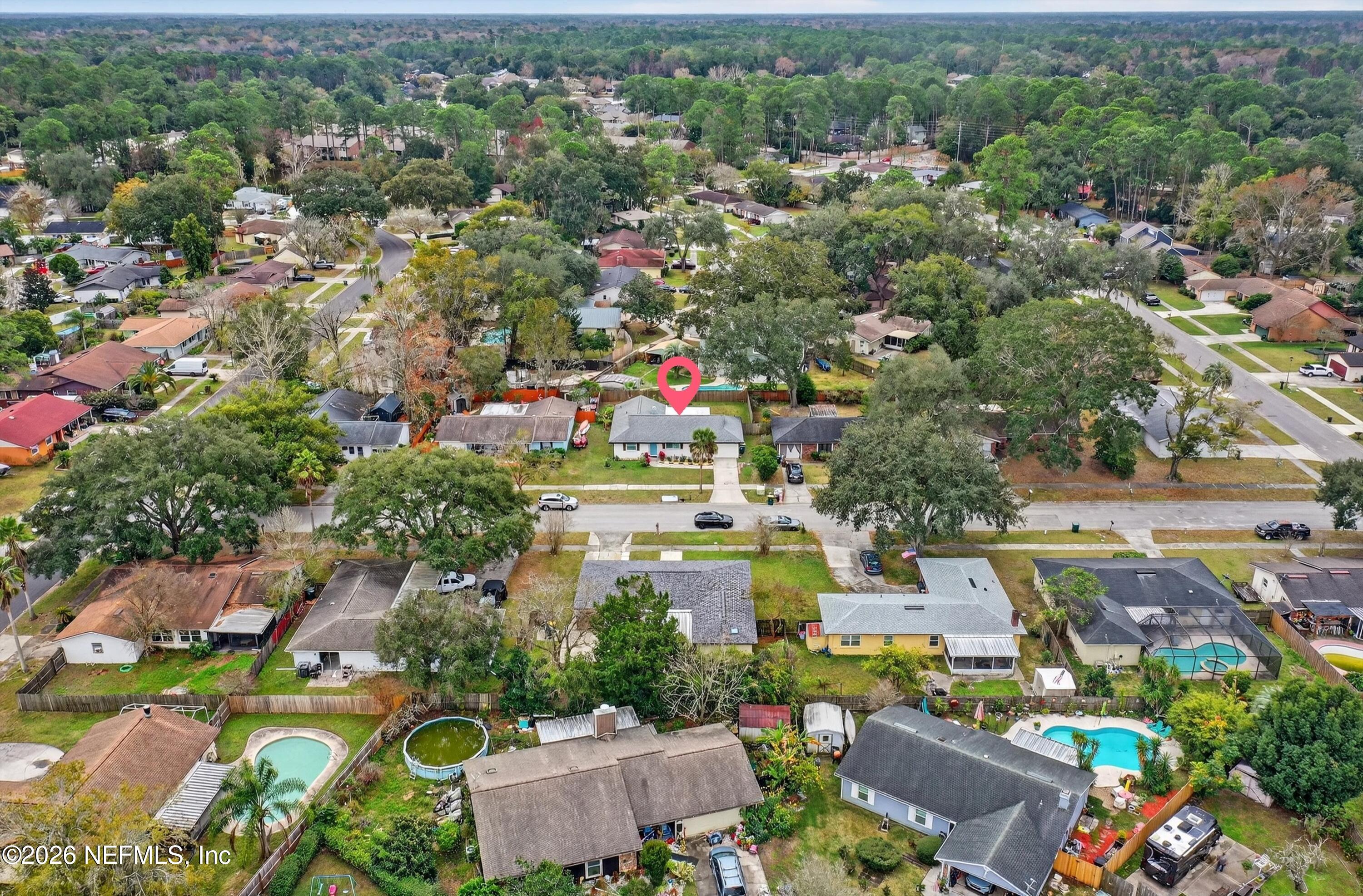 3570 Grassy Ride Drive Jacksonville, FL 32223 - Photo 41 of 51 an aerial view of residential houses with outdoor space