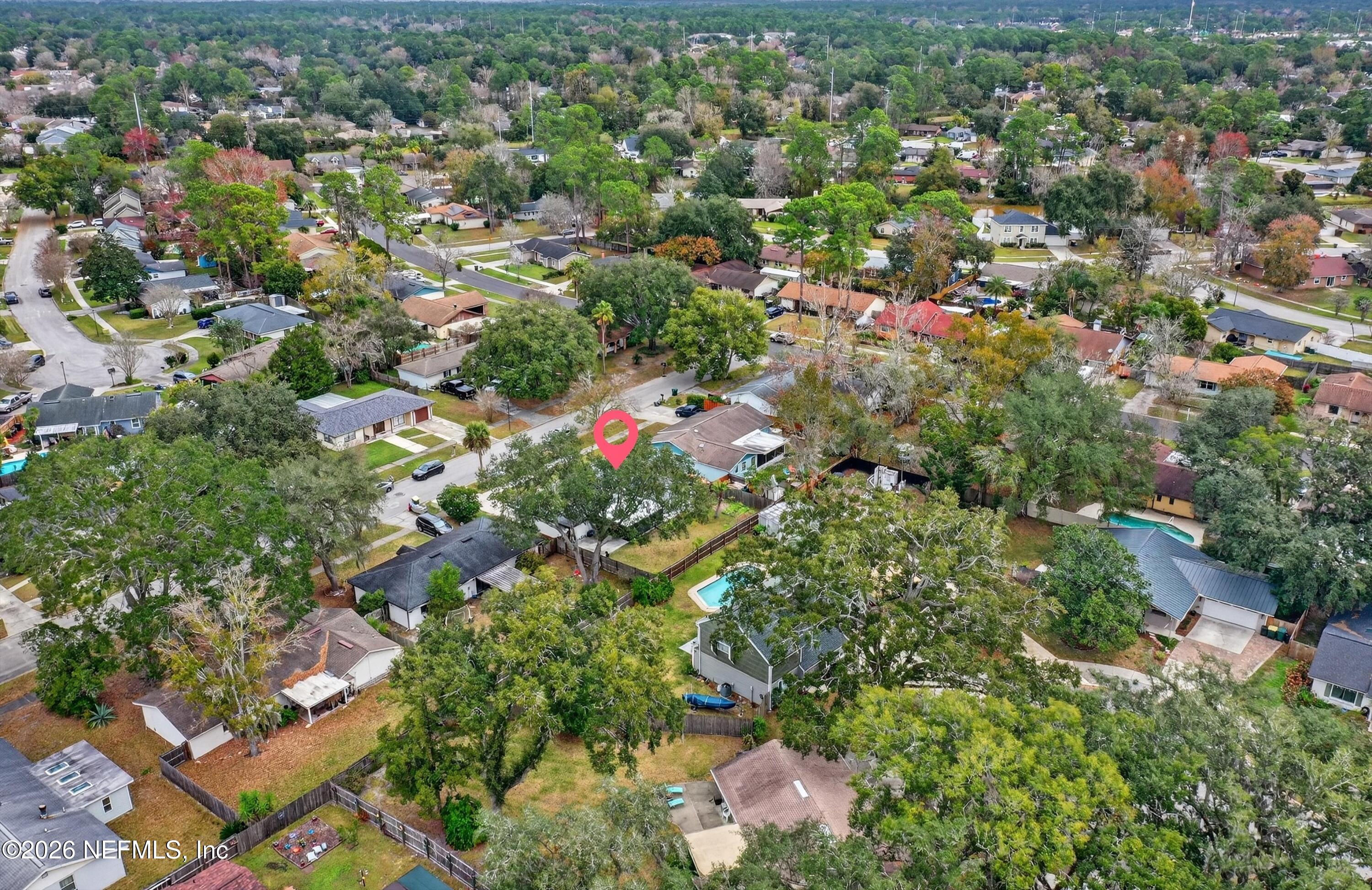 3570 Grassy Ride Drive Jacksonville, FL 32223 - Photo 43 of 51 an aerial view of residential houses with outdoor space and trees